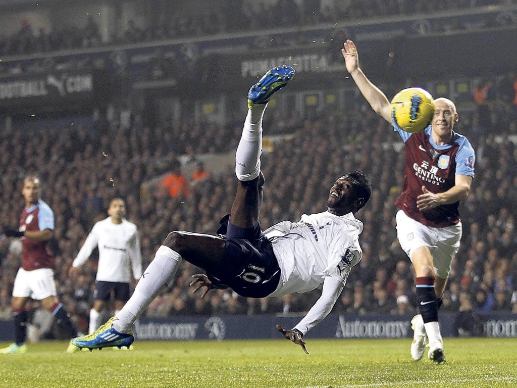 Emmanuel Adebayor scores his spectacular first goal against Aston Villa last night