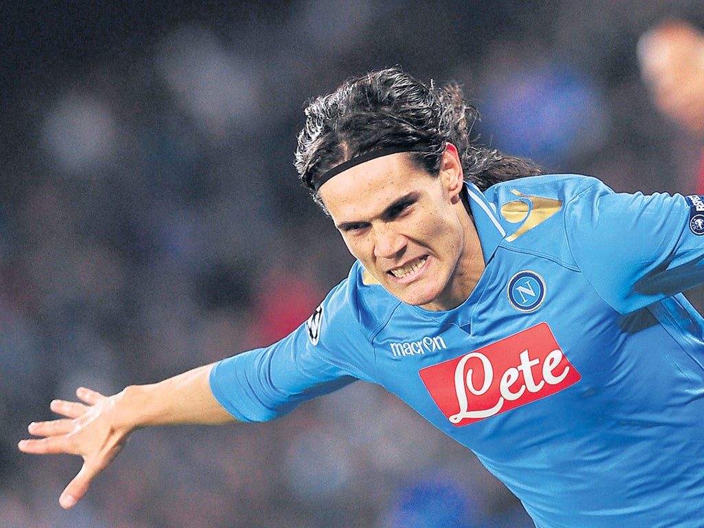 Napoli striker Edinson Cavani enjoys scoring one of his brace against Manchester City last night