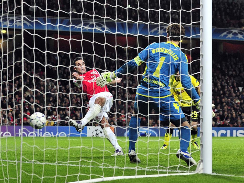 Robin van Persie scores his second of the match