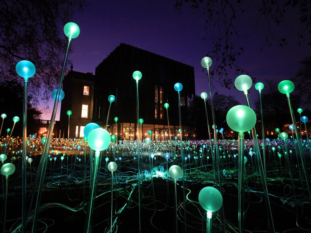 Glass spheres are illuminated in Bruce Munro's latest installation, Field of Light, in the grounds of the Holbourne Musuem in Bath.