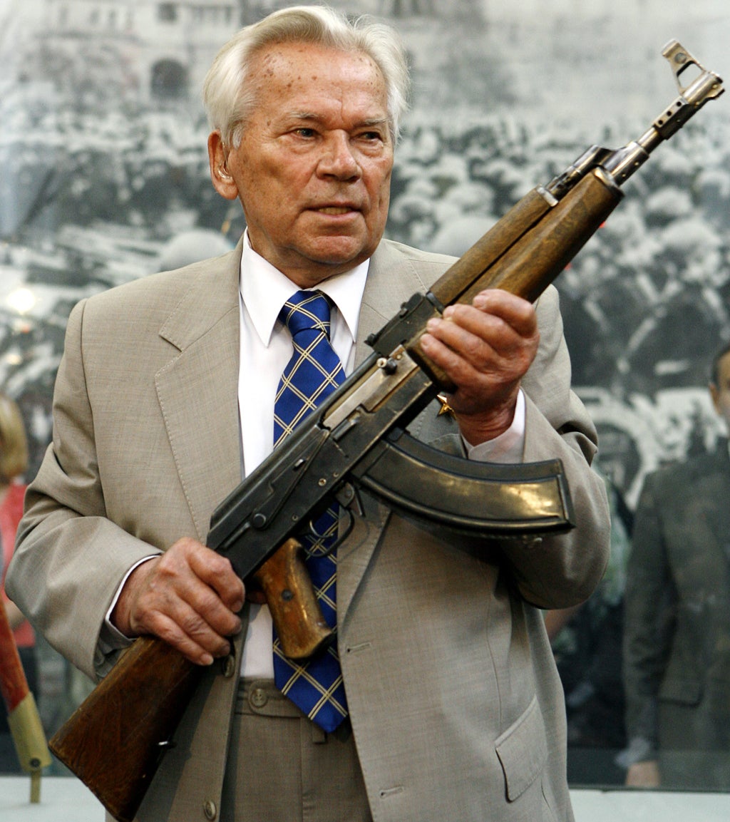 Mikhail Kalashnikov, now 91, holds the original AK-47 assault rifle