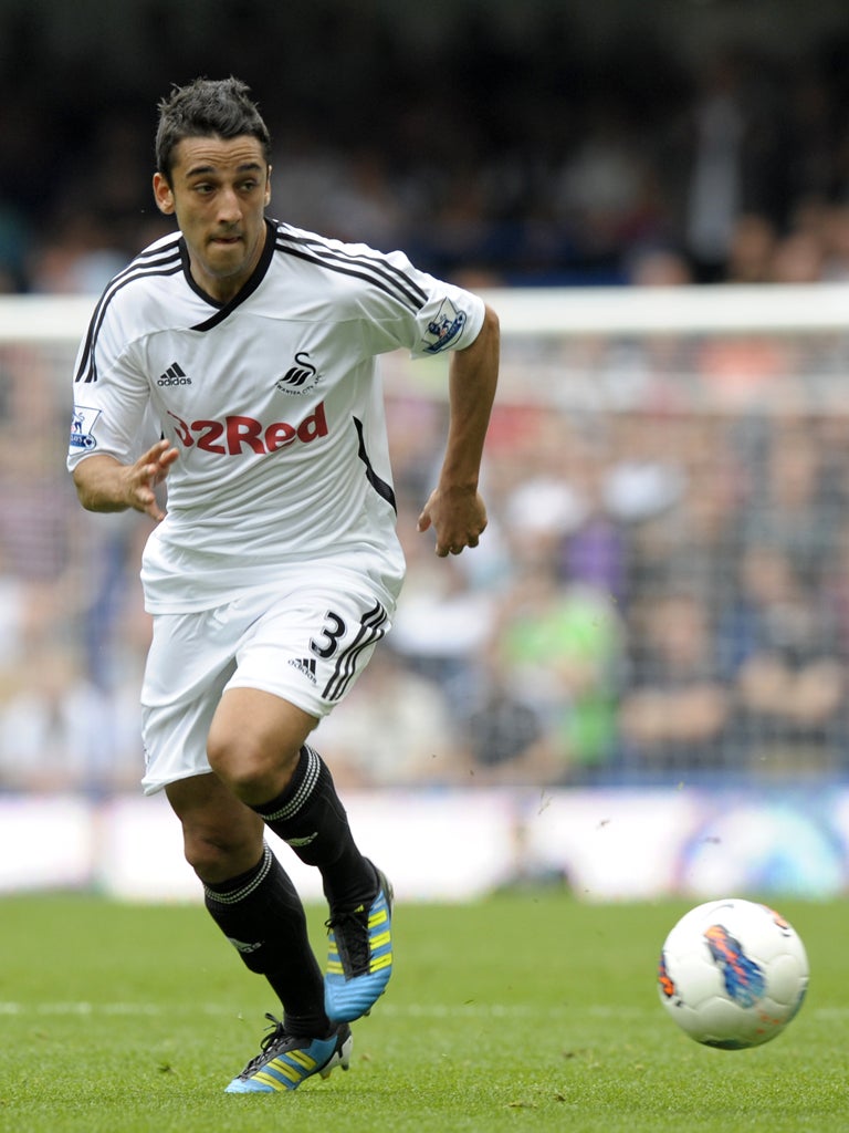 Swansea's highly rated full-back Neil Taylor was persuaded to remain at the Liberty Stadium despite a lucrative offer from Newcastle