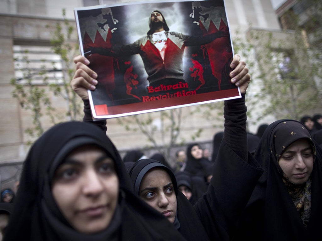 Iranians show support, last April, for Bahrain's Shia protesters outside the Saudi Arabian embassy in Tehran