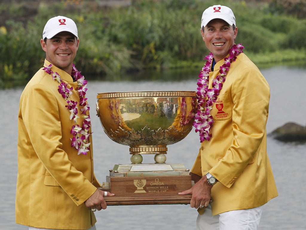 Matt Kuchar (right) and team-mate Gary Woodland celebrate