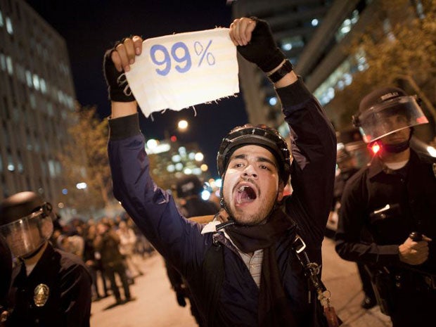 Police in riot gear began closing in early today on anti-Wall Street activists in LA