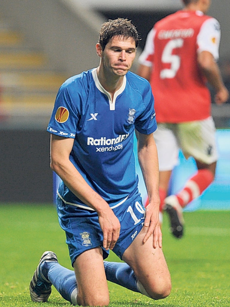 Birmingham's Nikola Zigic reacts to his penalty being saved