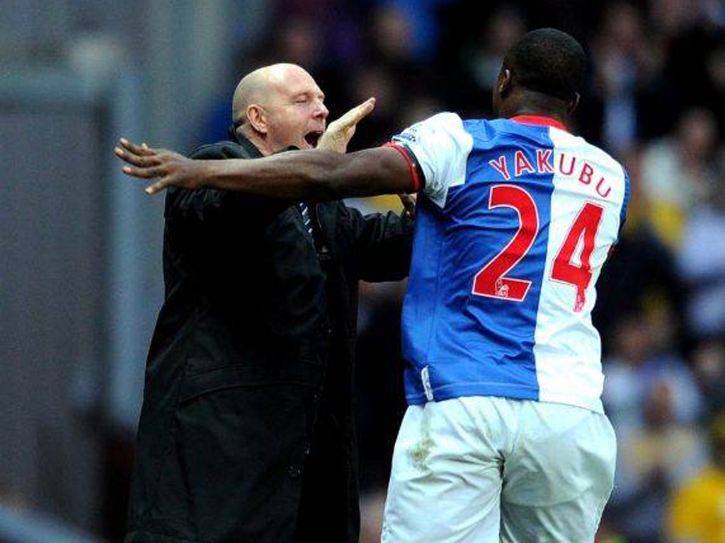 An ecstatic Steve Kean congratulates Yakubu Ayegbeni after the Nigerian striker helps himself to his first goal of the afternoon