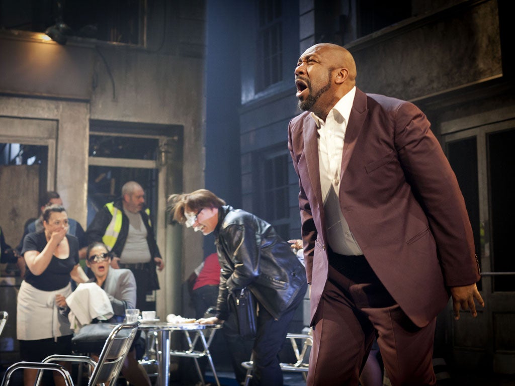 Lenny Henry plays Antipholus as a naive Nigerian, unaware that his twin is also in town