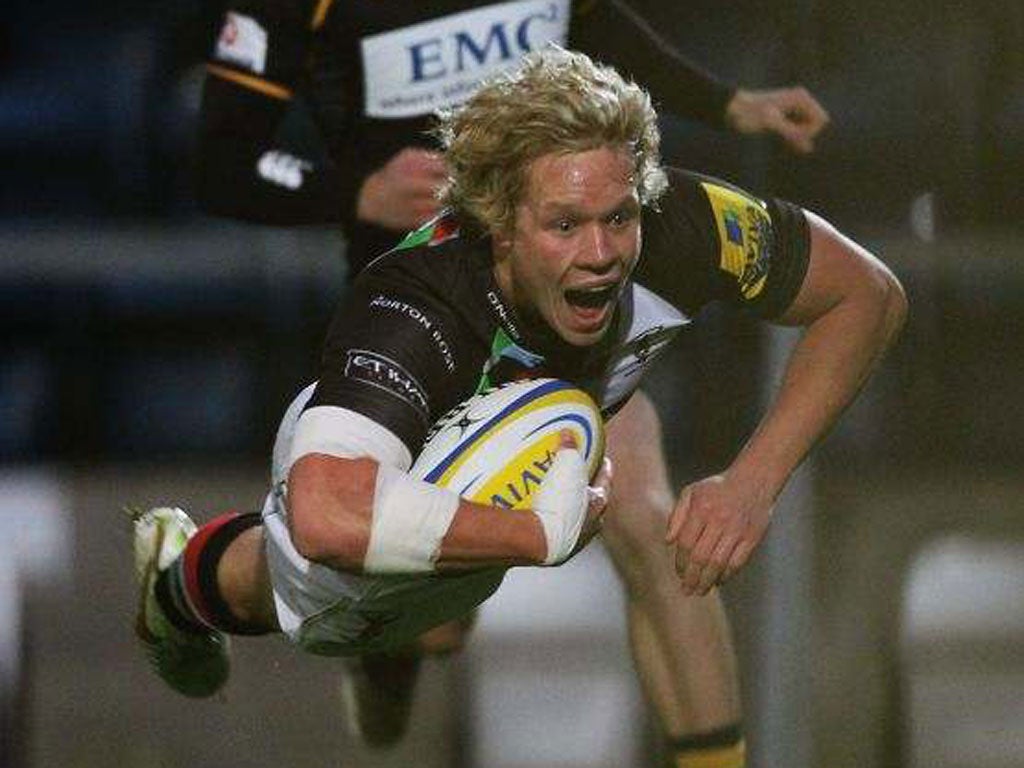 Matt Hopper of Harlequins scores a try against Wasps at Adams Park yesterday