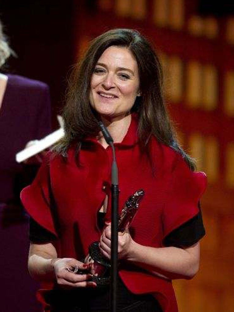 Bente Froge, the wife of Danish director Lars von Trier accepts the European Film 2011 prize for the film 'Melancholia' on behalf of her husband