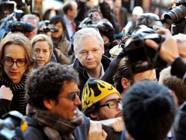 The High Court paved the way today for WikiLeaks founder Julian Assange (centre) to pursue his case against extradition