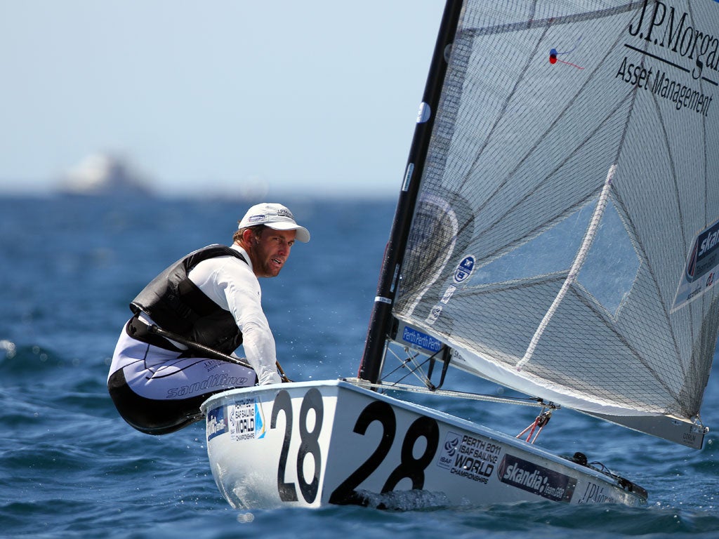 Triple sailing Olympic gold medallist Ben Ainslie crushed the opposition on the opening day of the Finn class world championship in Fremantle, Western Australia