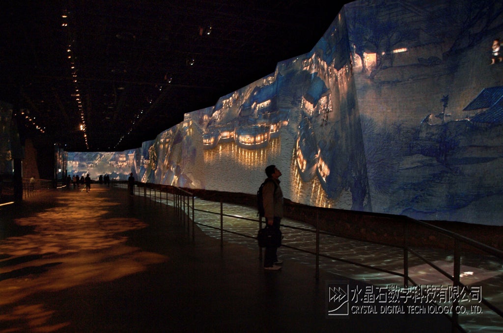 The Moving Masterpiece exhibition is a 128m by 6.5m animated reproduction of the painting Qing Ming Shang He Tu a national treasure painted by Song artist Zhang Zeduan in 11th Century. Over 30 times bigger than the original, the installation was the star attraction of the China Pavilion at the Shanghai World Expo in 2010 and has now toured Shanghai, Hong Kong, Macau, Taipei and Tai-Chung attracting over 10 million people