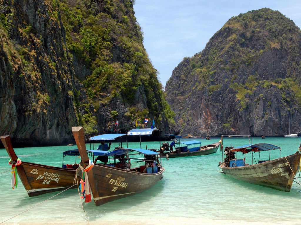 Pure shores: boats moored off one of Thailand's idyllic islands