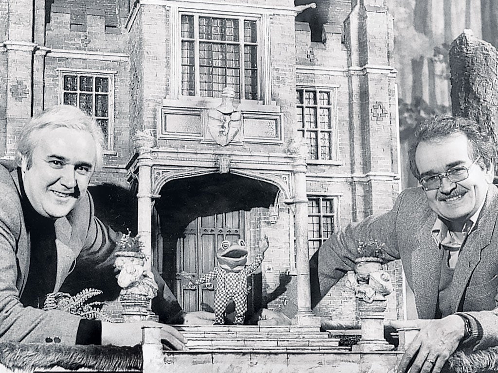 Hall, left, with Brian Cosgrove outside Toad Hall for their adaptation of 'Wind in the Willows'