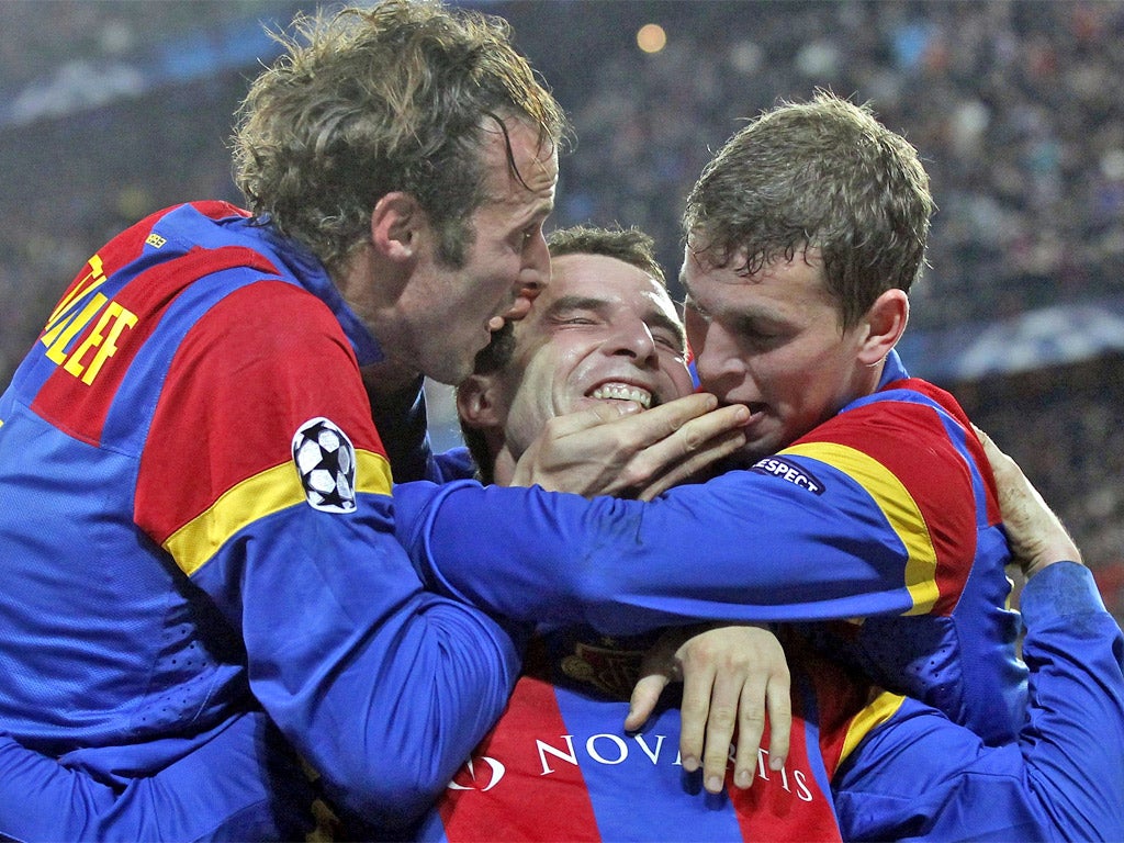 Alex Frei (middle) celebrates with teammates after scoring Basle's second goal