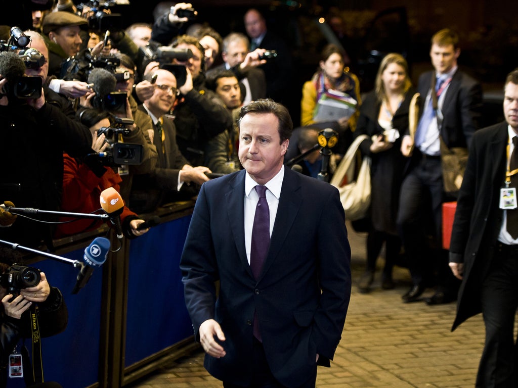 David Cameron cuts an isolated figure at the Brussels summit in 2011