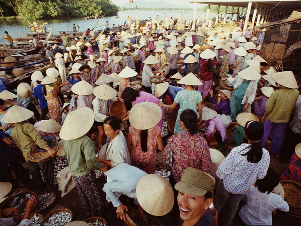 Hats off: A busy Vietnamese fish market