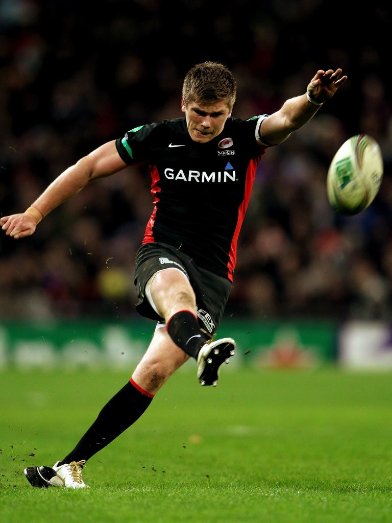 Saracens’ Owen Farrell kicks a conversion against the
Ospreys at Wembley