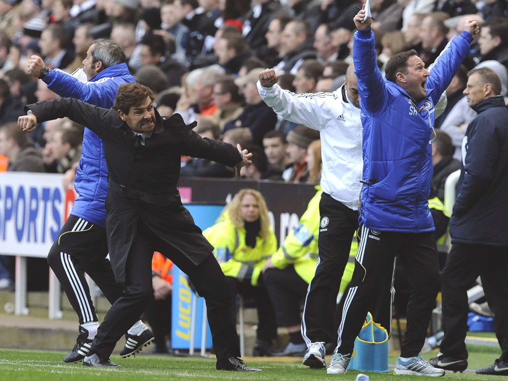 Andre Villas-Boas celebrates a Chelsea goal with his coaches,
not his players