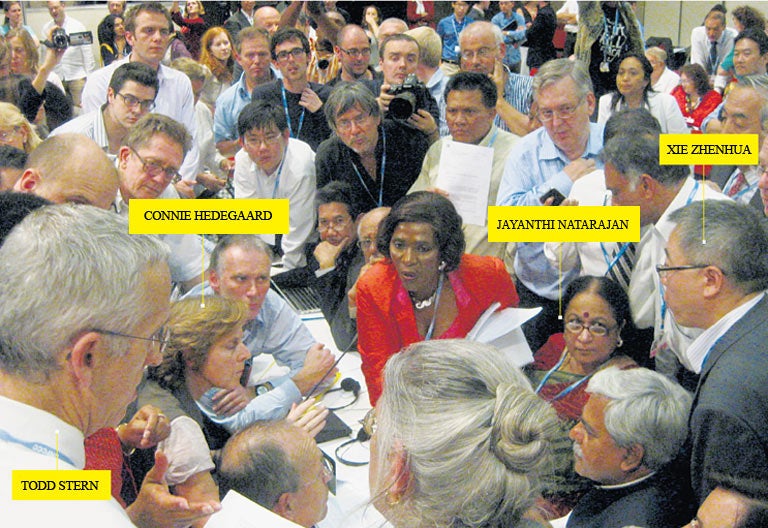 The deal was done at the International convention Centre on Sunday. The key players are Todd Stern, US Climate Envoy (front left, looking on), Connie Hedegaard, EU Climate Commissioner (seated at left, right hand raised), Jayanthi Natarajan, Indian Enviro