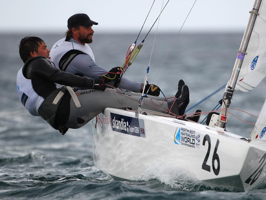 The physical strain is etched on the faces of Iain Percy (right) and crew Andrew Simpson