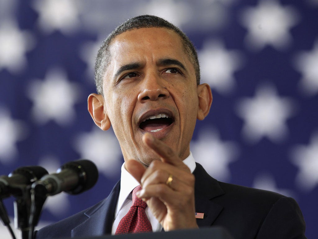 President Barack Obama saluted troops back from Iraq today