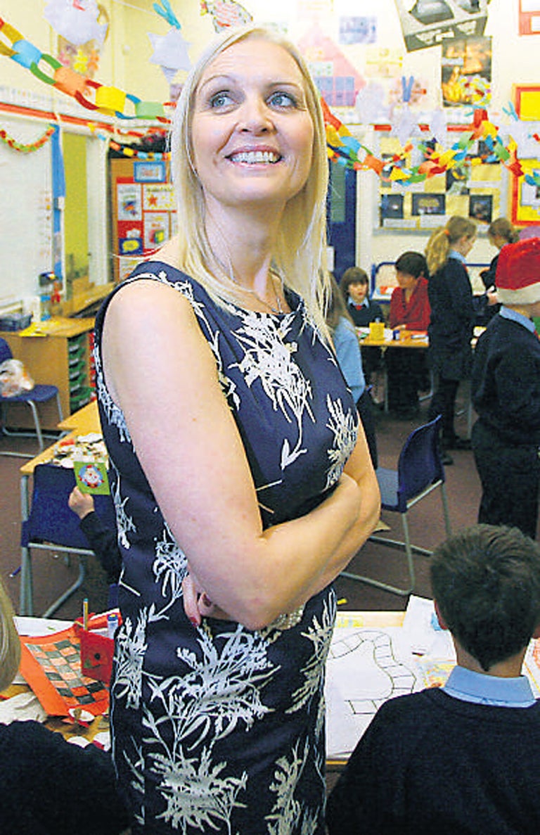 Head teacher Kim Halls with some of her pupils