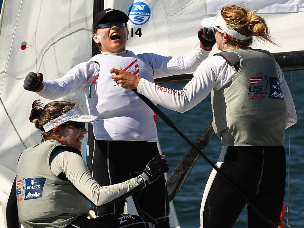 Anna Tunnicliffe, Molly Vandemoer and Debbie Capozzi celebrating winning Gold while Great Britain had to settle for Silver