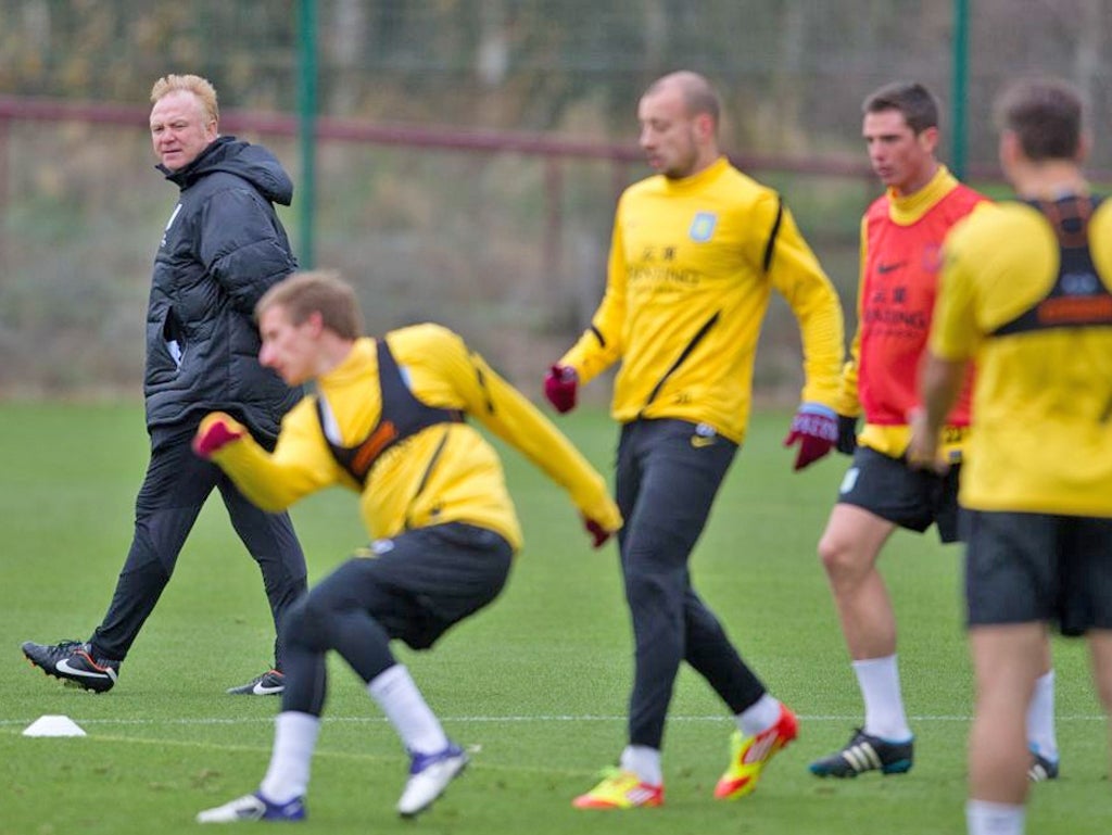 Rebuilding Villa: Alex McLeish observes his squad train at Aston Villa's Bodymoor Heath facility