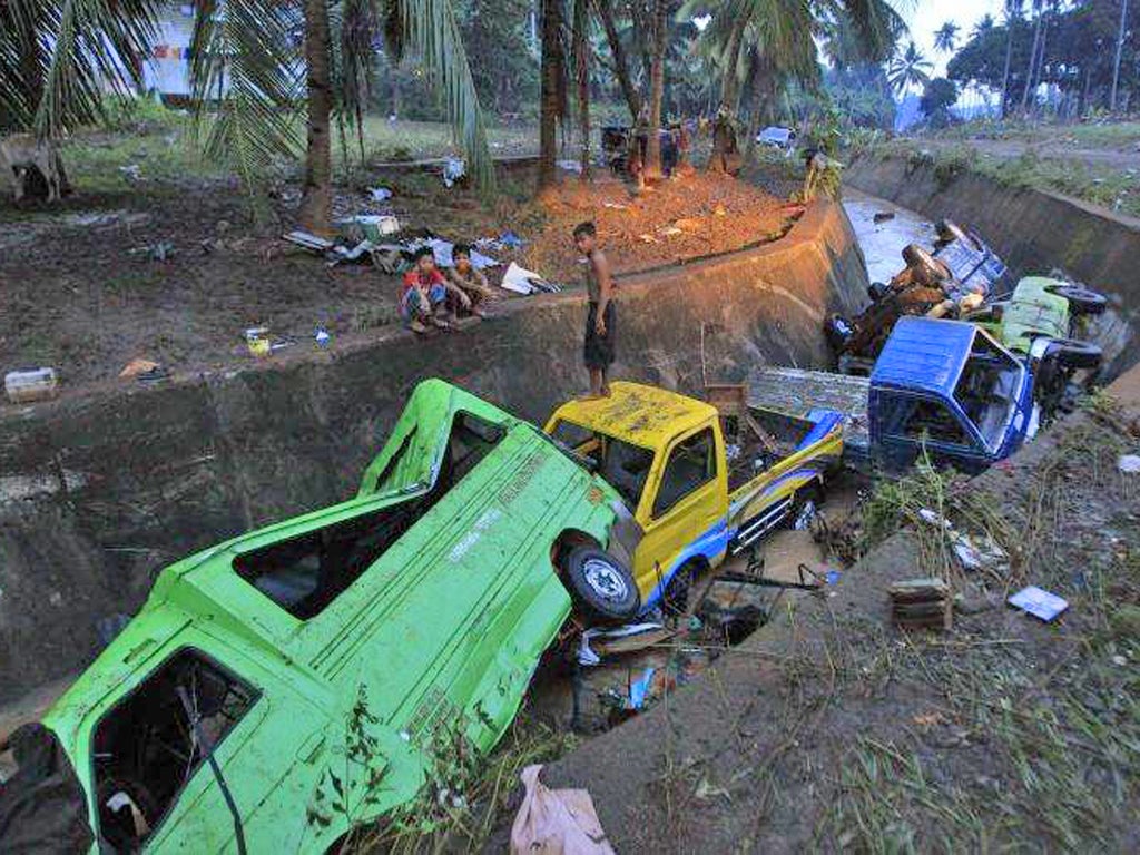 The scene in Balulang village in Cagayan de Oro in the wake of tropical storm Washi