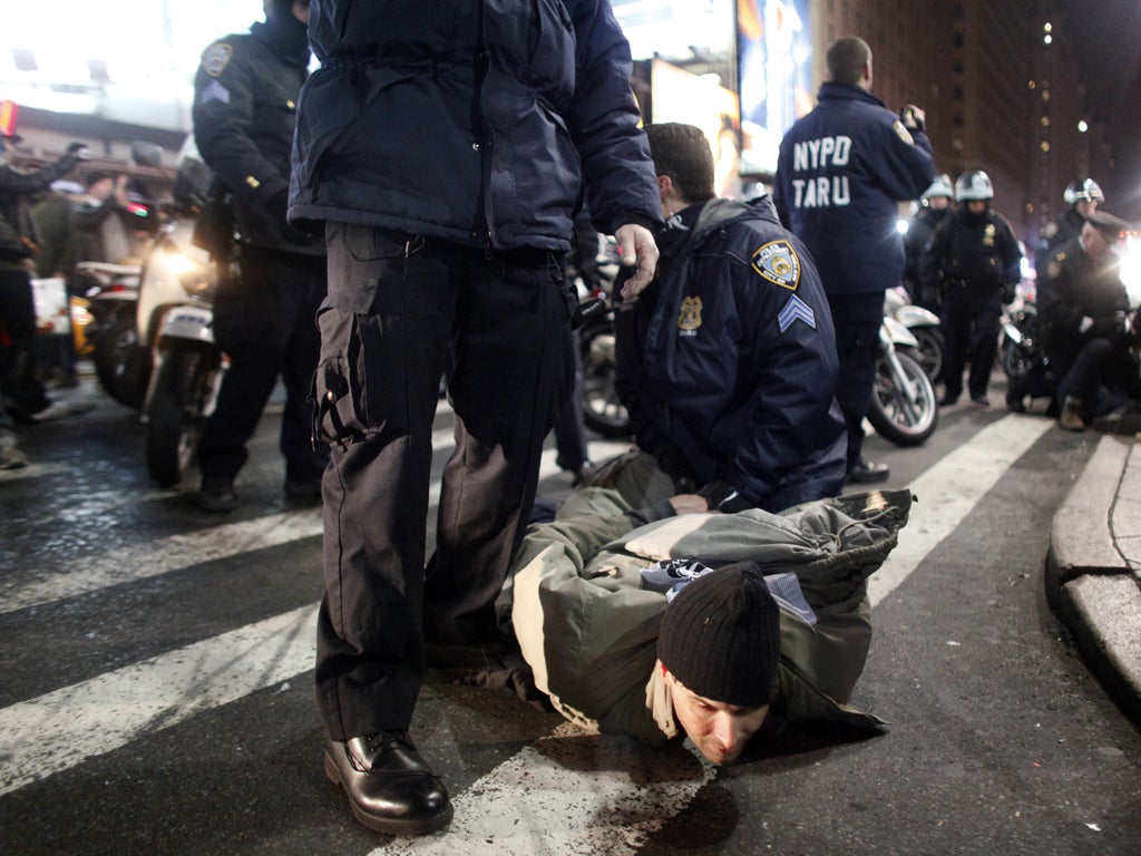 More than 50 anti-Wall Street protesters were arrested in New York at the weekend after they tried to climb a fence around Trinity Church in an effort to establish a new camp