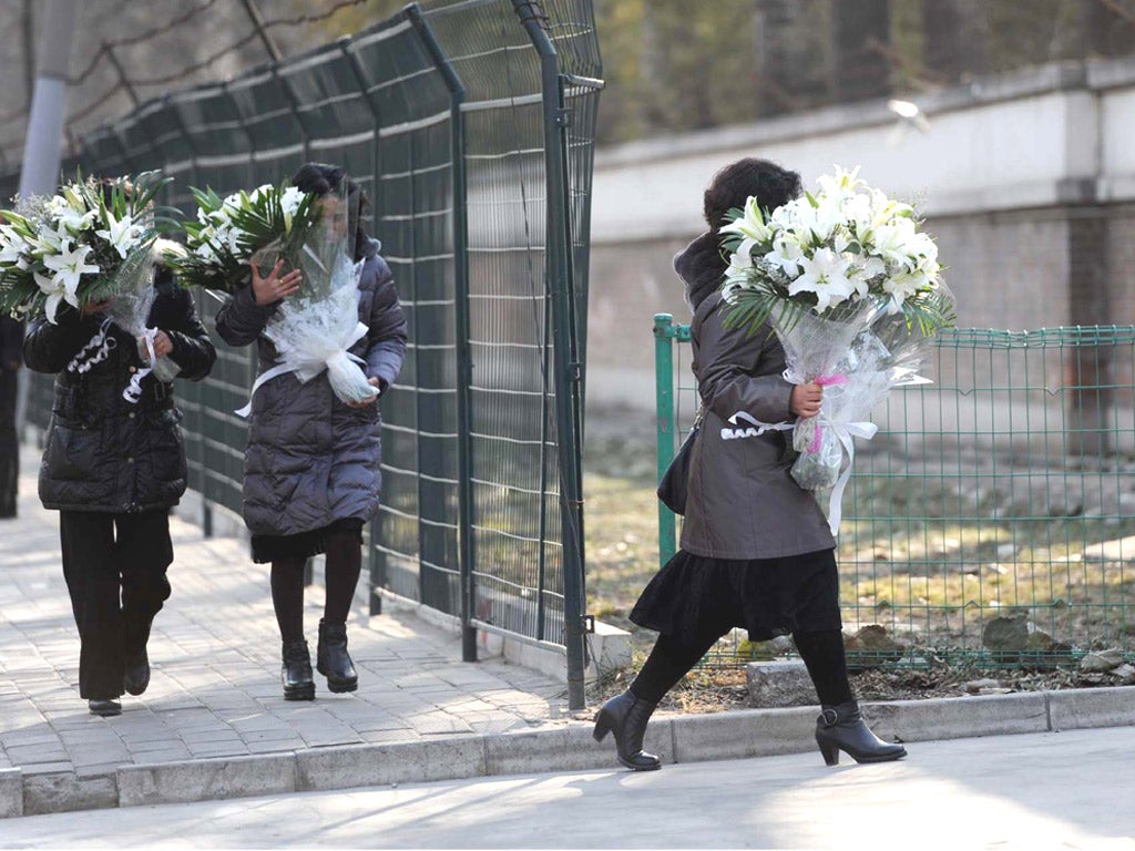 The North Korean embassy in Beijing was opened yesterday to allow mourners to enter the compound and pay their respects