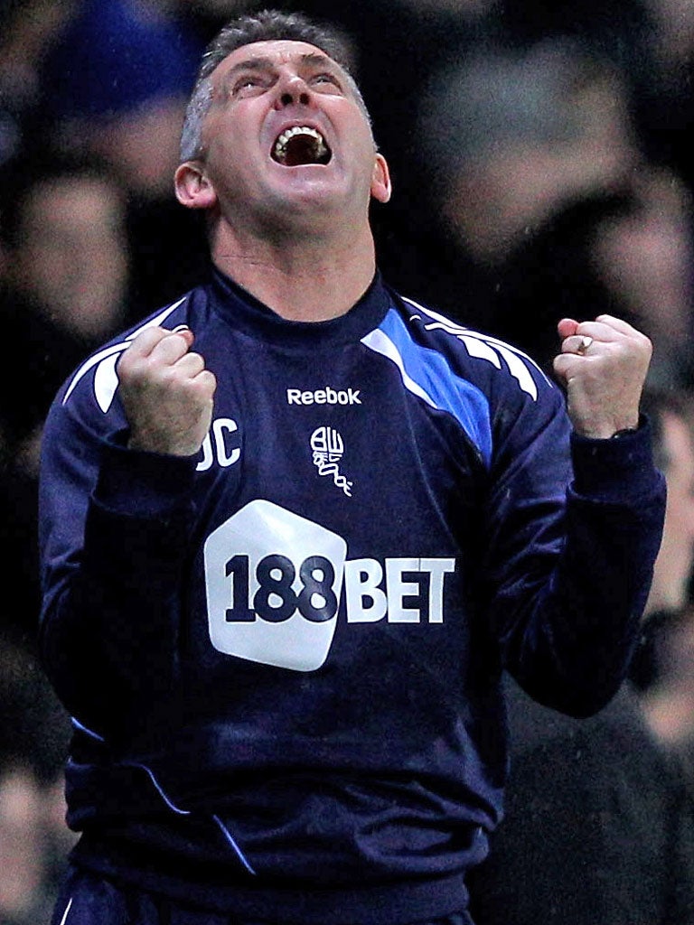 Owen Coyle shows his delight as Bolton's second goal goes in