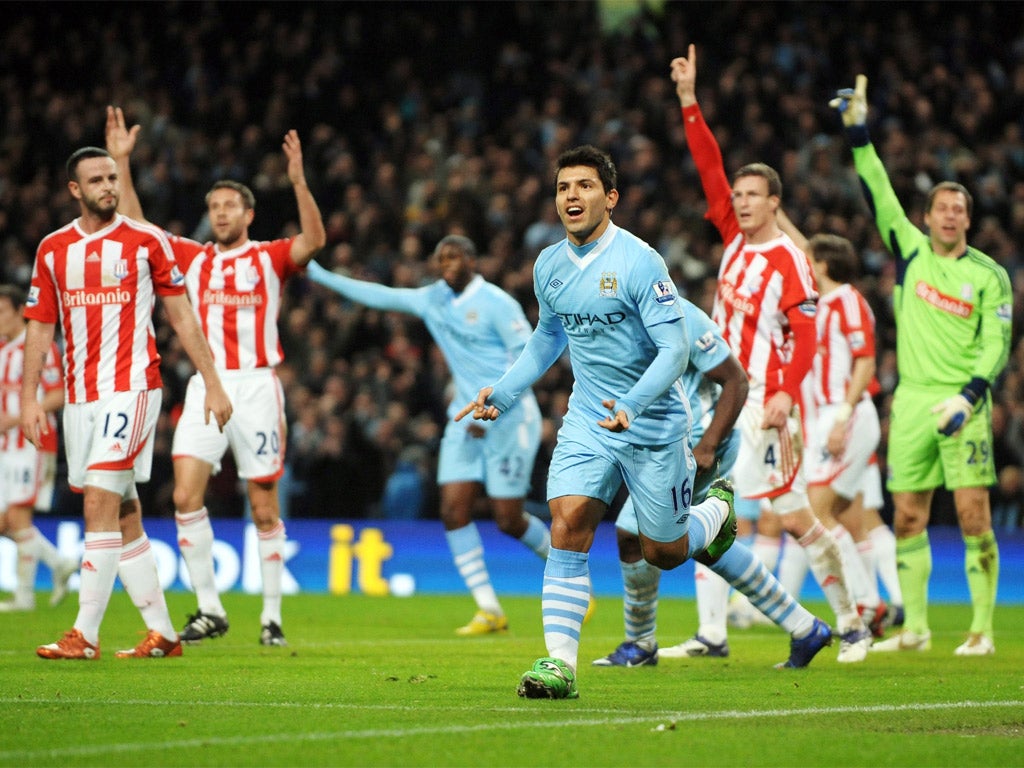 Stoke defenders appeal for offside after Sergio Aguero's first goal