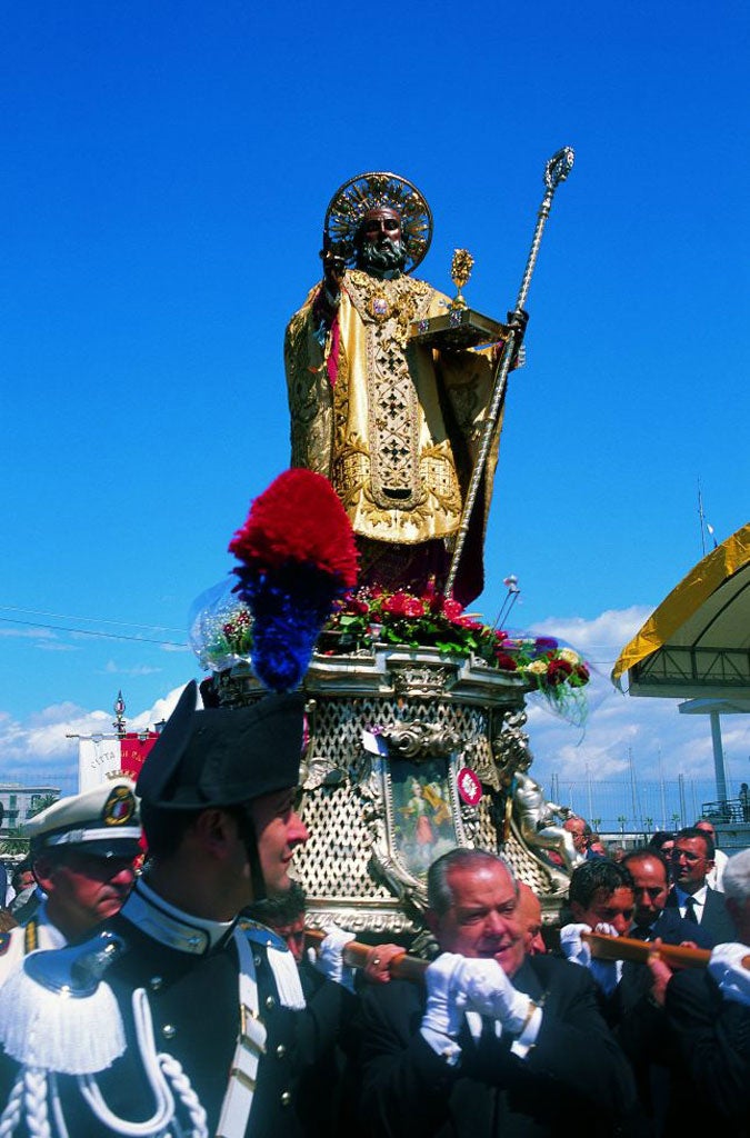 The Saint goes marching in: Bari's townspeople celebrate Saint Nicholas, whose relics are housed
in its basilica