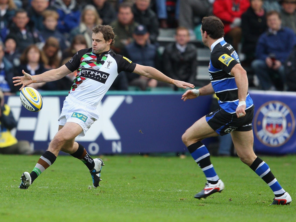 Harlequins' prolific points-scorer Nick Evans (left) in action against Bath, a side going nowhere despite a huge cash injection