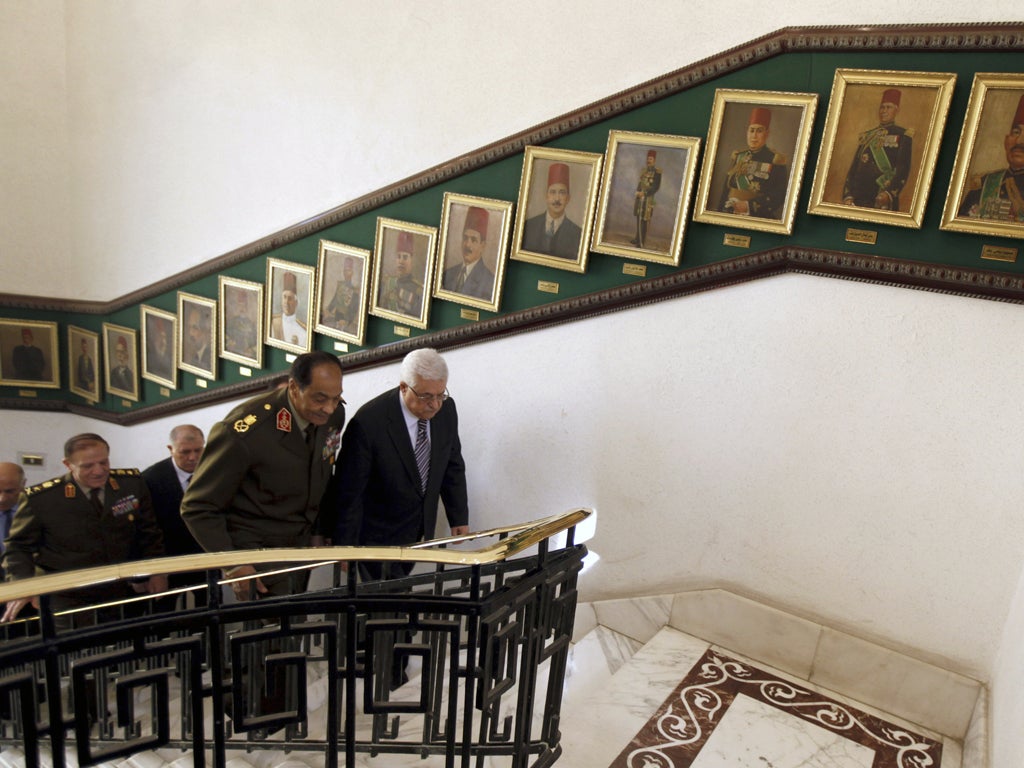 Field Marshal Hussein Tantawi, the head of Egypt’s armed forces, with the Palestinian President Mahmoud Abbas, centre,in Cairo