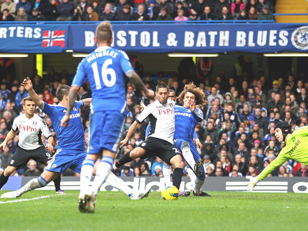 Clint Dempsey gets in front of David Luiz to score Fulham’s equaliser at Stamford Bridge