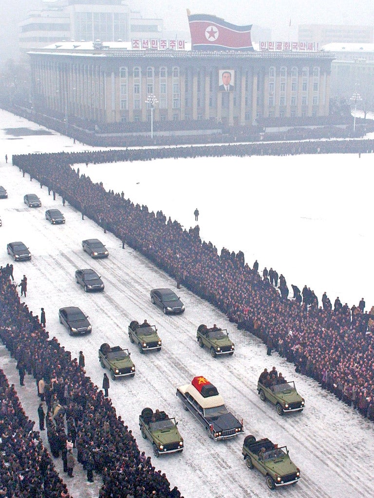The funeral procession arrives at Kumsusan Memorial Palace in Pyongyang