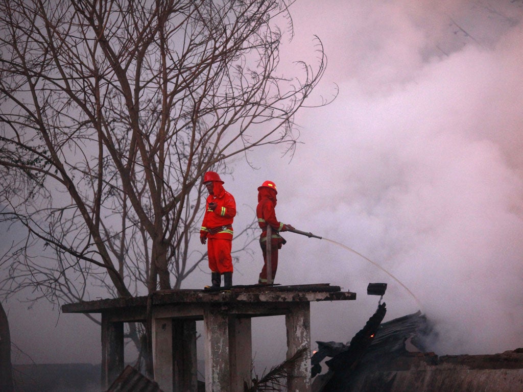 The fire started in a state-owned warehouse before dawn today