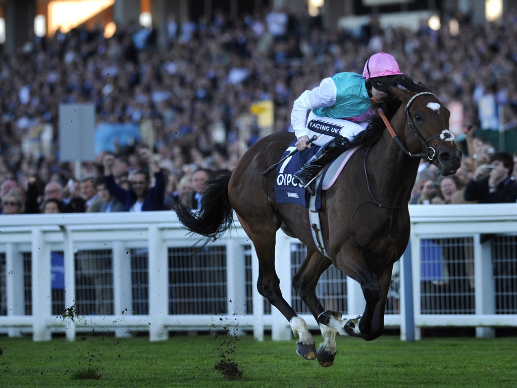 Tom Queally riding Frankel goes on to win the Queen Elizabeth II