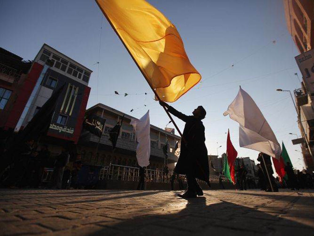 Shia Muslims prepare for the festival of Ashura on 1 December in Baghdad. Shia festivals were previously banned