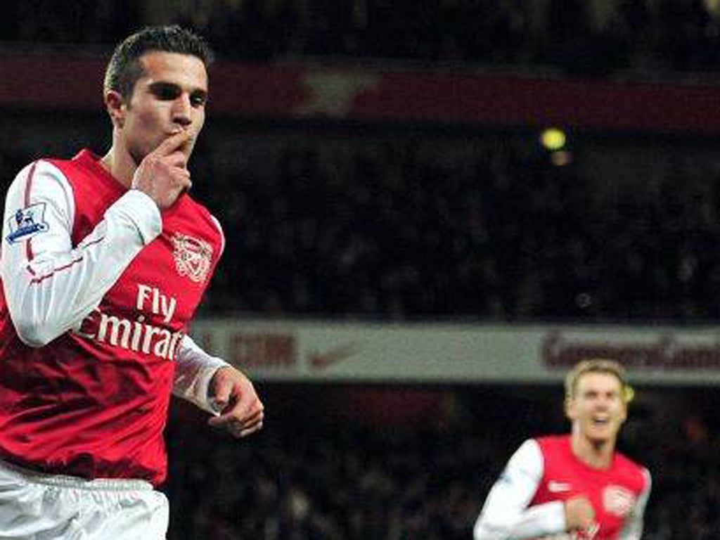 Robin van Persie celebrates scoring the winner