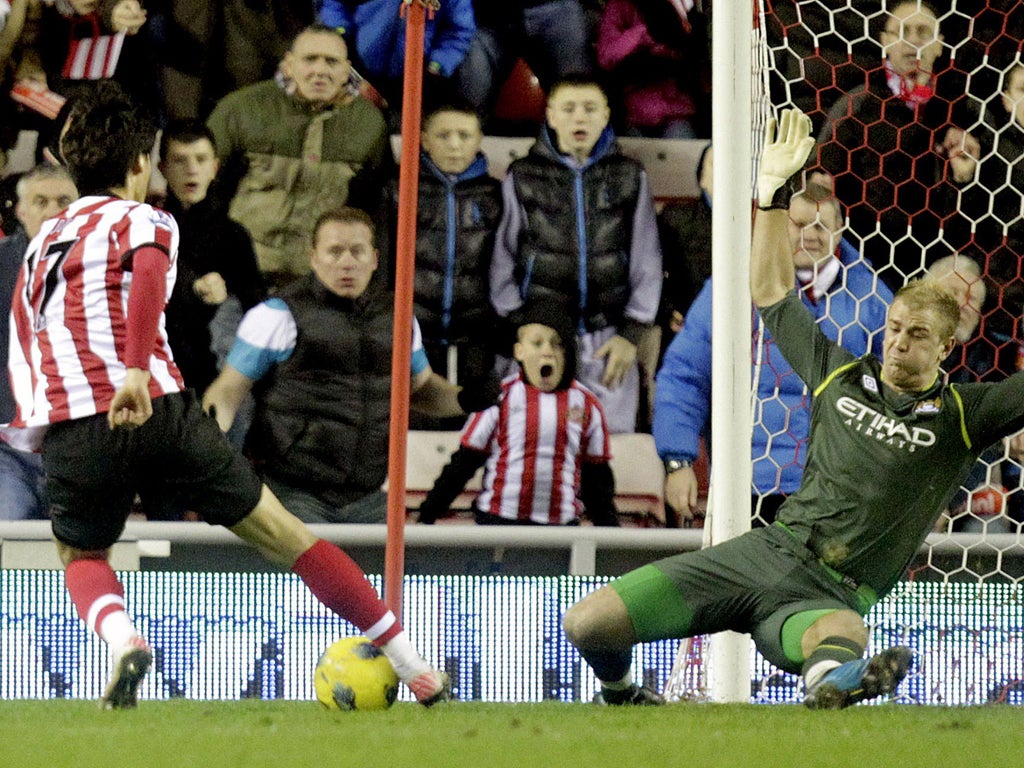Sunderland’s Ji Dong-won goes round City’s goalkeeper
Joe Hart to score the winner in added time