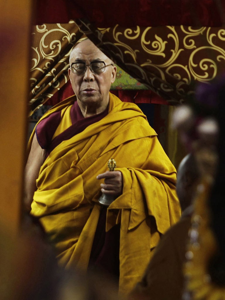 The Dalai Lama performed rituals on the first day of the Buddhist festival of Kalachakra