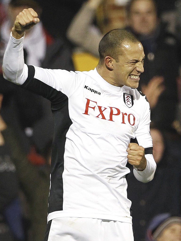 Bobby Zamora punches the air afters coring a last-gasp winner against Arsenal at Craven Cottage last night