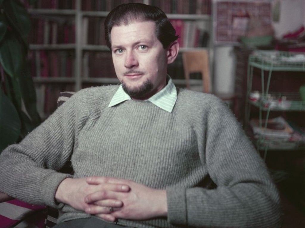 English cartoonist and illustrator Ronald Searle at his work desk in 1956