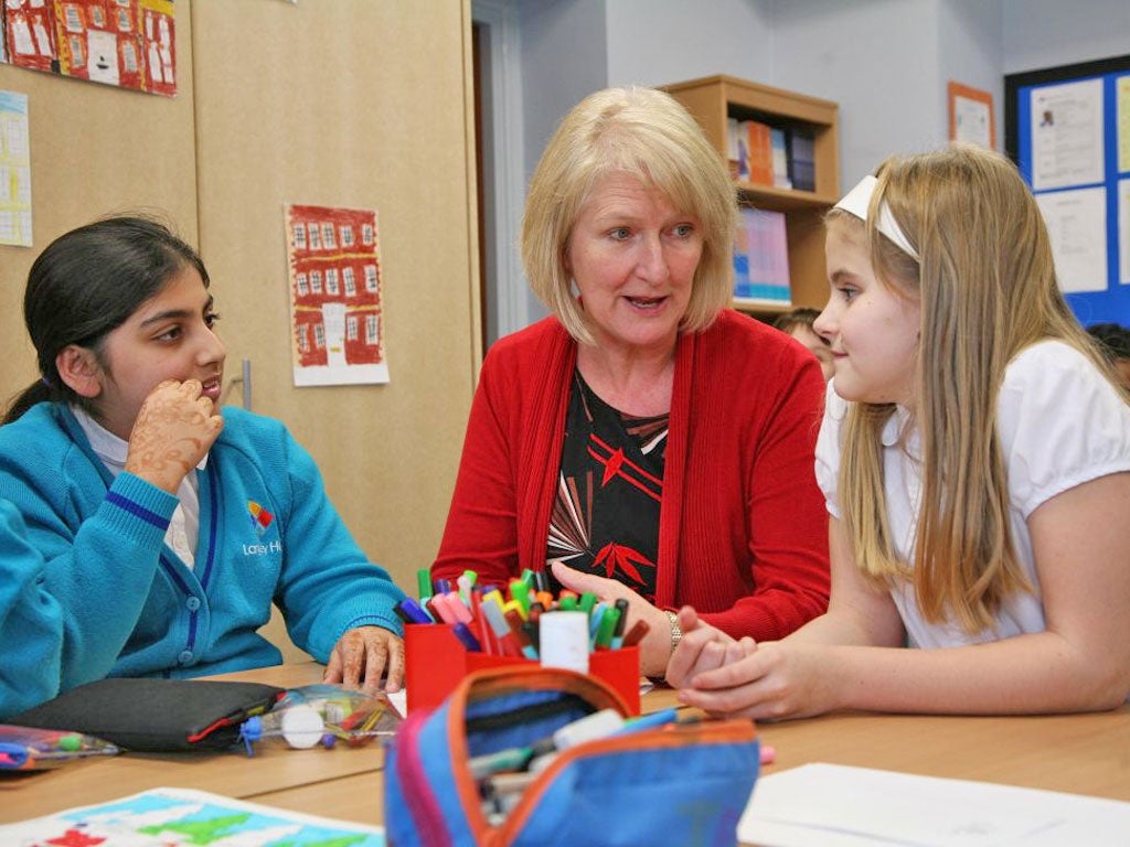Up and running: Langley's head of school, Jane Sculpher, with pupils
