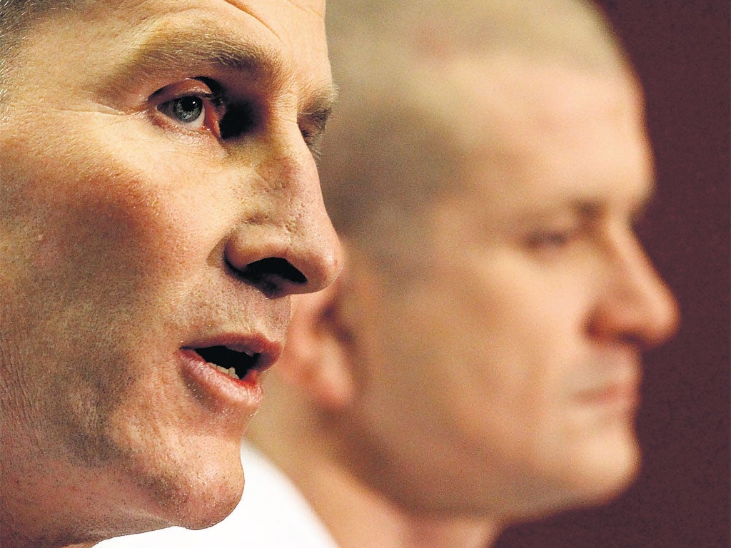 Stuart Lancaster (left) and Graham Rowntree face the media